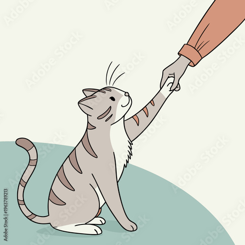 A cat extends its paw to connect with a person's hand during a quiet time together. The soft fur and gentle gesture show trust.