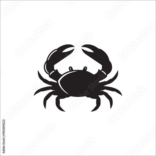 Crab Silhouette: A stark black silhouette of a crab, its claws raised in a striking pose, captures the essence of coastal life. 