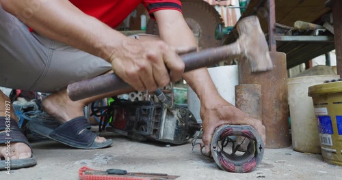 Business industry man hand fix electric motor tool in home business DIY