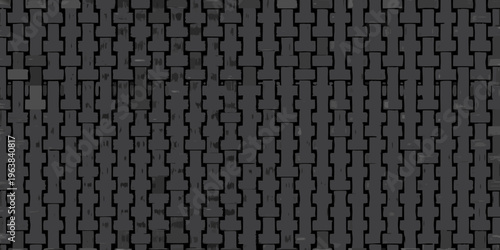 Close up of a dark woven rattan or wicker texture pattern