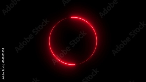 A glowing red circle shines brightly against a dark background