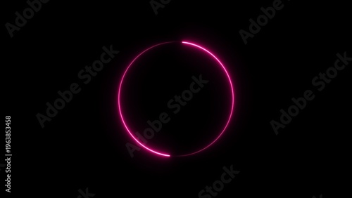 A vibrant pink neon circle glows brightly against a dark background