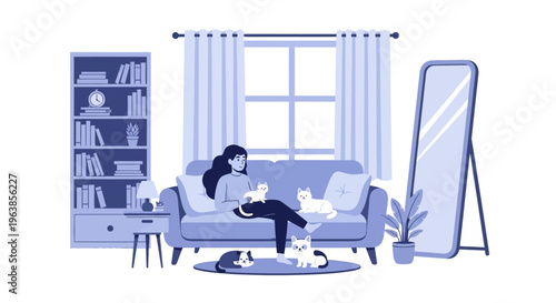 Woman sitting on couch with laptop.