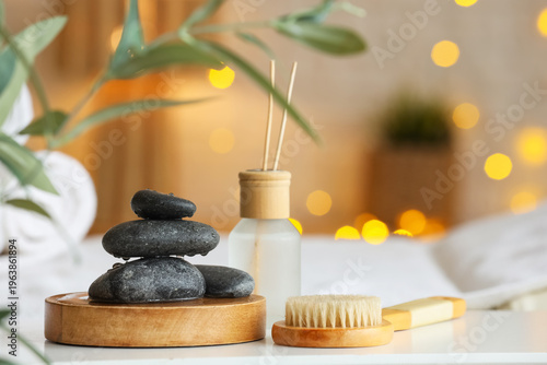 Wet spa stones with reed di...