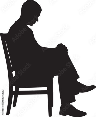 Silhouette of a sad or pensive man sitting on a chair isolated on white