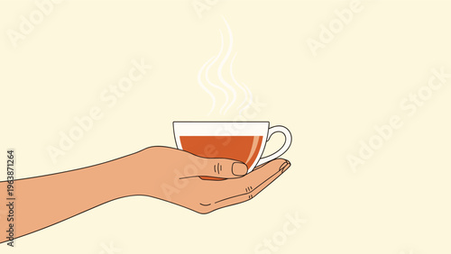 Human hand carefully holding a clear glass cup filled with hot steaming tea against a plain pale yellow background.