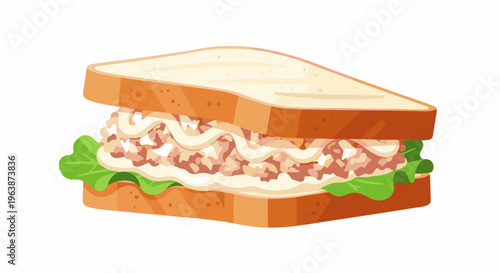 A triangular sandwich filled with chicken salad and lettuce