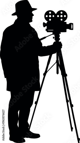 Silhouette of person operating vintage style film camera on tripod