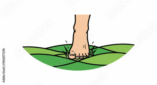 A bare foot presses into a soft, grassy hill