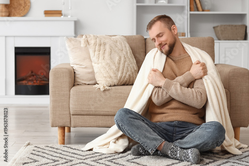 Young man in beige sweater ...