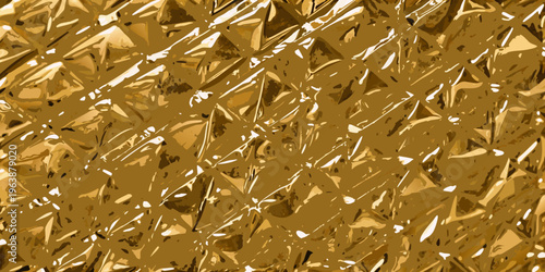 Close up of a shimmering textured gold foil background with highlights