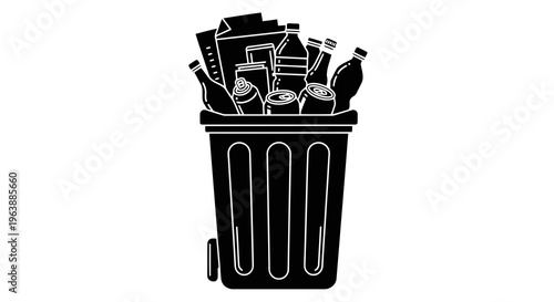 A black trash can overflowing with various waste materials and debris.