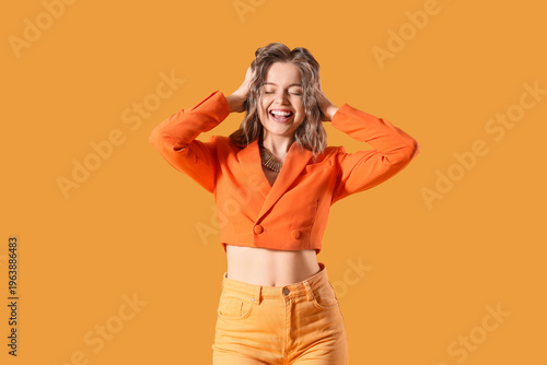 Happy young woman in stylis...
