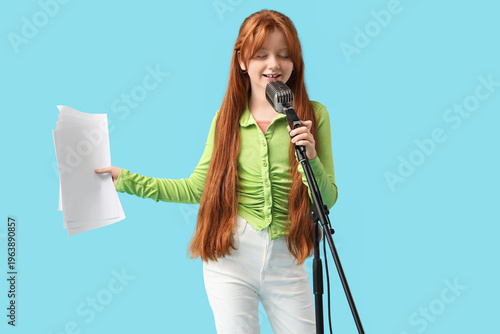 Teenage redhead girl with m...