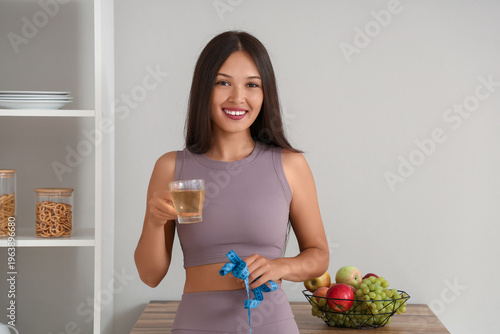 Beautiful young happy Asian...