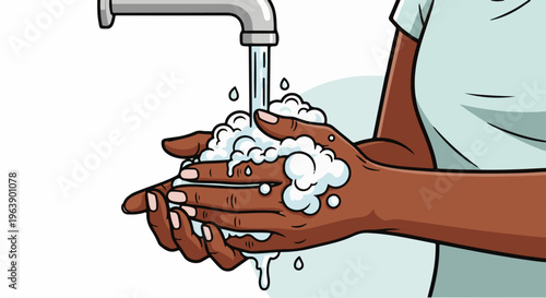 A person is washing their hands with soap under a faucet