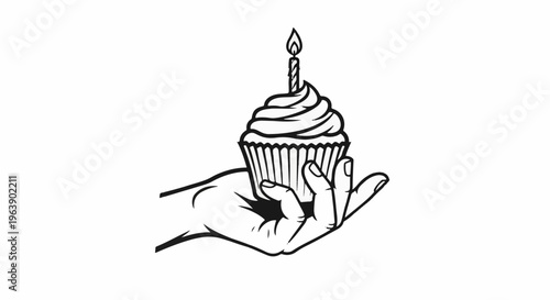 A hand holds a frosted cupcake with a single lit candle