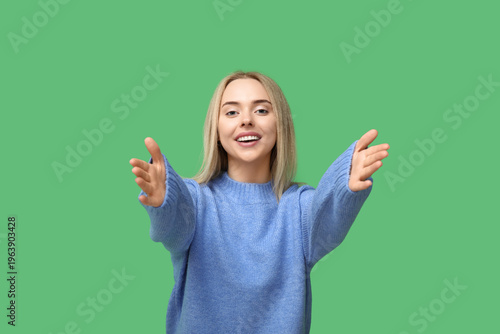 Young woman opening arms fo...