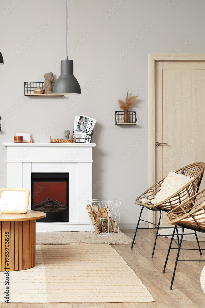 Fototapeta premium Interior of modern living room with fireplace and chairs