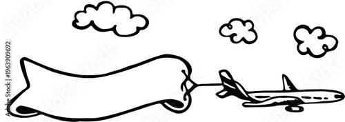 An airplane flies through clouds while pulling a long banner in the sky