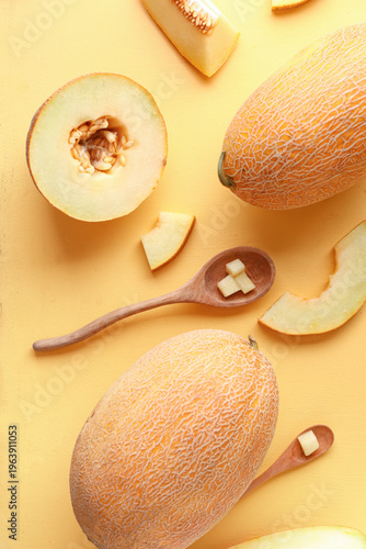 Sweet melons and wooden spo...