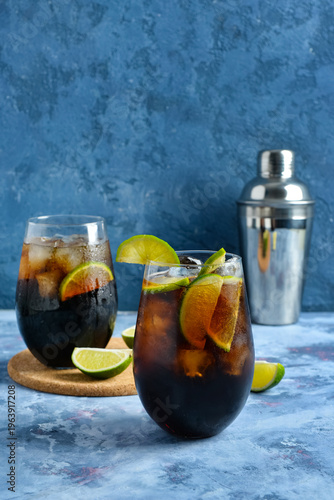 Glasses of cold Cuba Libre ...