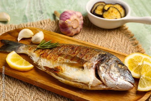 Board with tasty grilled do...