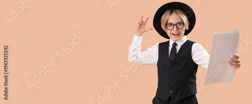 Little actor holding movie ...