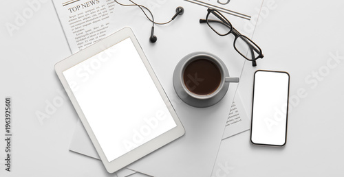 Cup of coffee, newspaper, t...