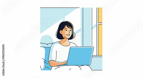 A woman smiling as she works on a laptop at home in a brightly lit room