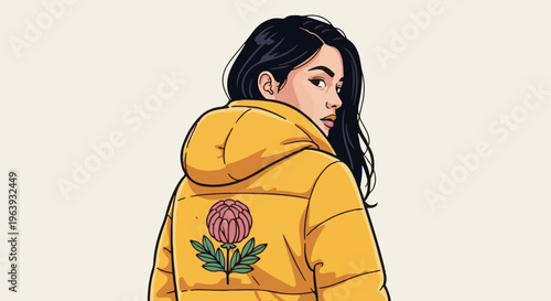 A stylish woman with dark hair turns to look over her shoulder