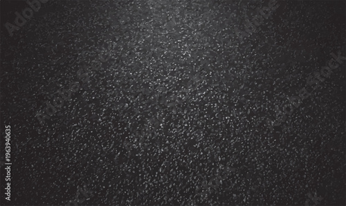 Dark grey asphalt texture with subtle light gradient and granular surface details