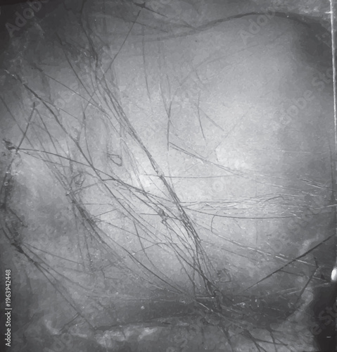 Distressed grey surface with dark chaotic scratches and grunge texture overlay