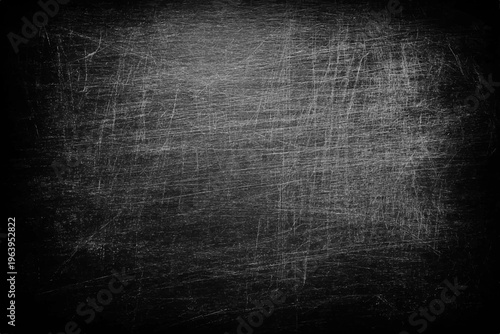 Dark grey chalkboard texture with heavy scratches and worn surface details