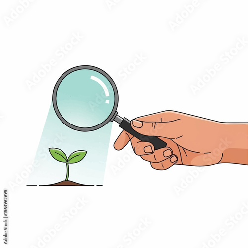 A hand examines a young plant with a magnifying glass closely.