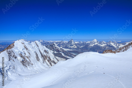 Mountain glacier panorama with summits Lyskamm, Breithorn and Matterhorn (left to right) seen from Signalkuppe in Pennine Alps, Switzerland
