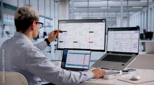 Hispanic Finance Professional Monitoring Business Expenses Via Cloud-Based