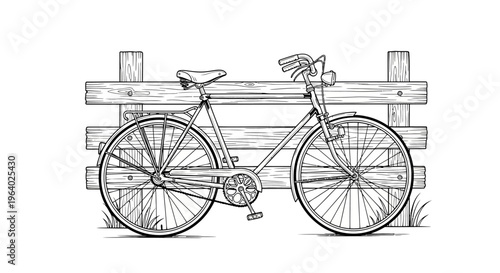 Bicycle parked against wooden fence outdoors.
