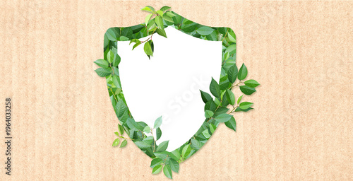 Horizontal paper background with shield made from green leaves. Safety, global ecological resource, go green concept. Environmental conservation, wildlife protection, Eco-friendly, Green energy