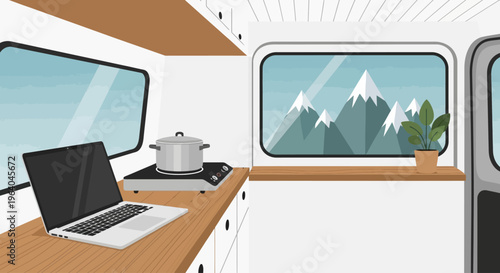 Laptop on camper van countertop.