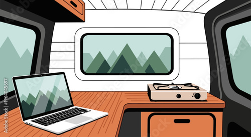 Laptop on wooden table inside van.