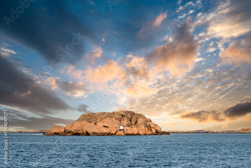 Humlesäcken rock formation off Lysekil in Bohuslän, Sweden, at edge of Stångehuvud nature reserve on Skagerrak coast in warm sunset light