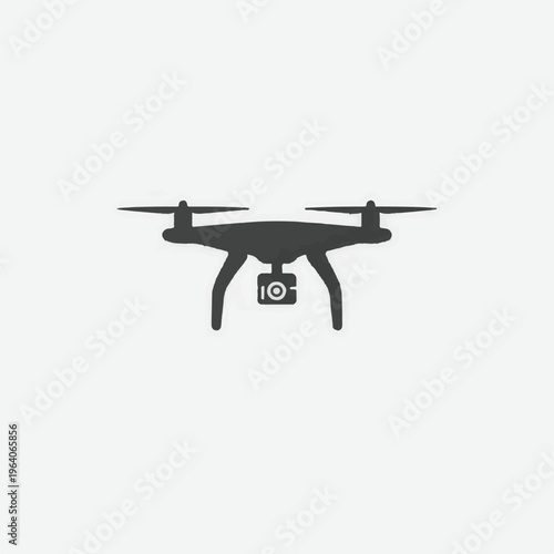 Dark grey silhouette of a drone with a camera quadcopter
