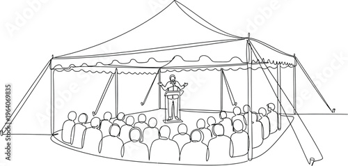 people sitting under a tent with a man standing