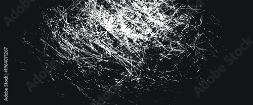 Distressed grunge texture with white scratches on black background