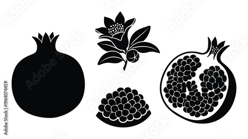 Set of whole pomegranate fruit, half pomegranate, pomegranate seeds and pomegranate flower