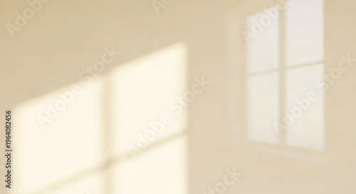 Soft Sunlight Casting Geometric Shadows on a Plain Wall.