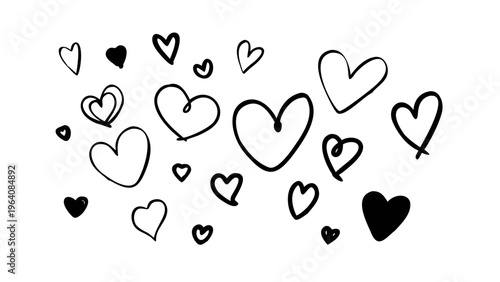 Hand-drawn black heart sketches scattered on white background in studio light