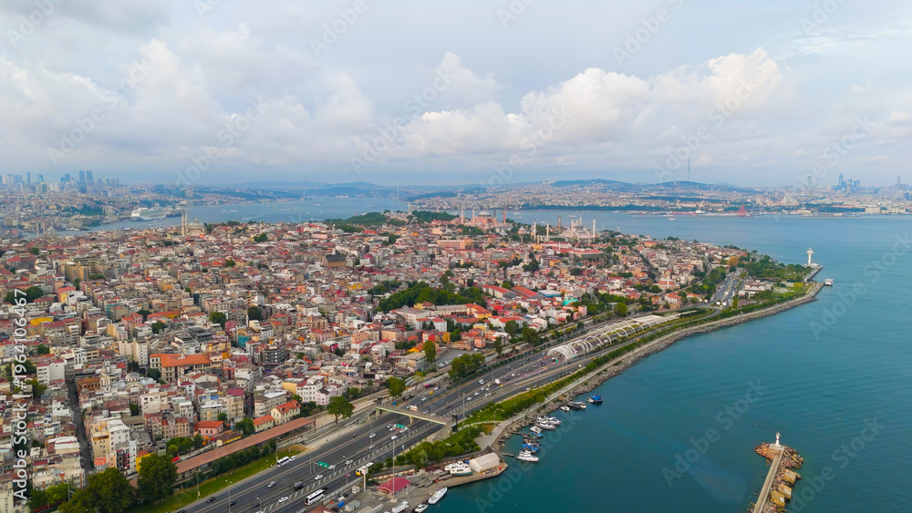Fototapeta premium Istanbul, Turkey. Bosphorus embankment. Historical city center. Fatih district. Cloudy weather at sunset, Aerial View