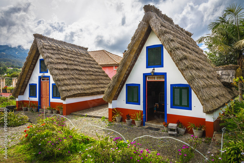 Cute rural wooden houses with thatched roof in Madeira, Portugal